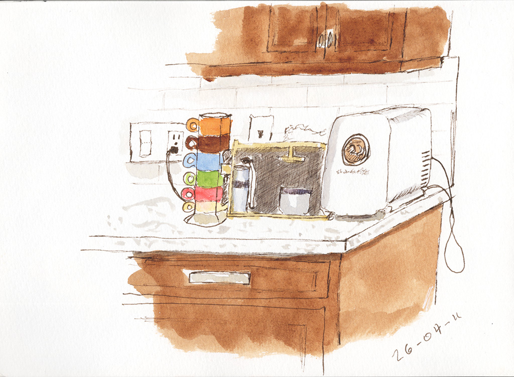 Ink and watercolor sketch of a kitchen counter with a stack of colorful cups, a coffee maker, a container, and a white temperature-controlled sourdough starter box beneath wooden cabinets.